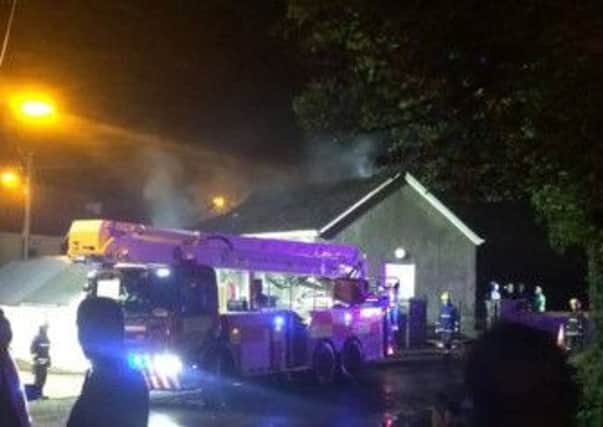 Emergency services at Convoy Orange Hall early this morning, Friday, after a fire caused serioius damage.