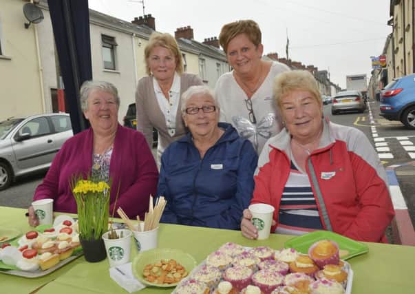 Valerie Moore, second from right, proprietor of Home Sweet Home, Bond Street, pictured with, from left, Lilly Lindsay, Roberta Moore, Nora Hawthorne and Mabel Watson, who enjoyed her recent Macmillan World's Biggest Coffee Morning event. INLS3814-125KM