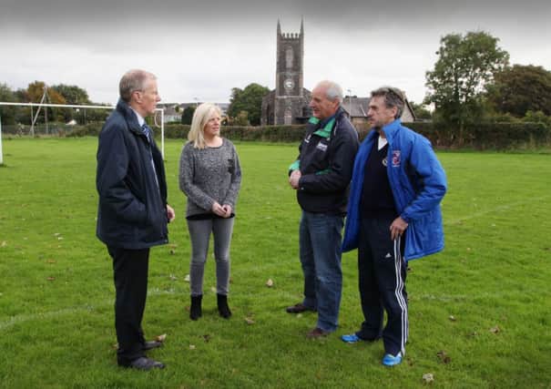 Gregory Campbell MP, Eleanor Cole, club treasurer, Des McAfee, club chairman, and Jackie McAfee, team manager, pictured at Macosquin FC Football Pitch.