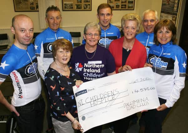 Muriel Barr, Catherine O'Hara and Samina Bonar, of the NI Children's Hospice, are pictured receiving a cheque for £4575 from Nigel Kernohan, John Maxwell, Neil Kerr, Jim Burns and Hazel Hughes of Ballymena Road Club. £3000 was raised by the Road Club from the recent Billy Kerr Sportive and a further £1575 was raised by Billy's son Neil. INBT40-202AC