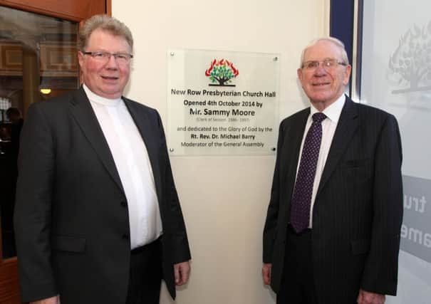The Rt. Rev. Dr. Michael Barry, Moderator of the General Assembly, and Mr. Sammy Moore, former Clerk of Session, officially open the New Row Presbyterian Church Hall on Saturday. INCR41-313PL