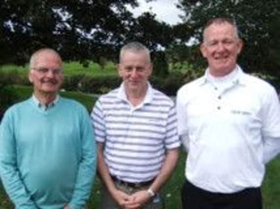 Jim Matthews, who won last Saturday's competition with a nett 59, is pictured between two of his playing partners, Bobby Geddis and David Cherry.