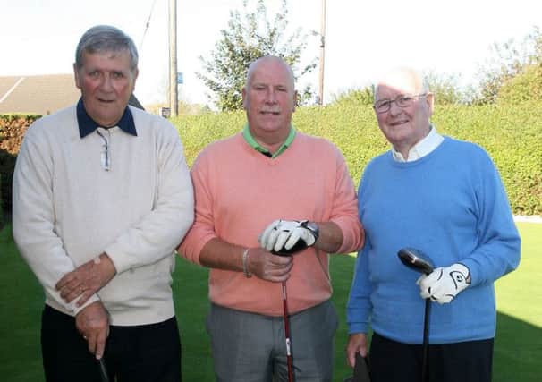 Andy Gardiner, Rab Doey and James Hamilton pictured prior to teeing off at Ballymena Golf Club. INBT41-210AC