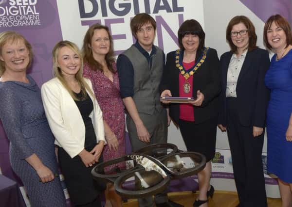 Pictured in The Old Town Hall at the launch of the Digital Teen Programme are from left Therese Rafferty (Head of Regeneration), Eva Keenan (Programme Coordinator), Carol Fitzsimmons (Chief Executive of Young Enterprise), Daryl Conway (Digital Champion), Banbridge District Council Chairman Cllr Marie Hamilton, controlling the "drone", Mary Young (Invest NI) and Elaine McAlinden (Enterprise Development Officer) © Edward Byrne Photography INBL1440-211EB