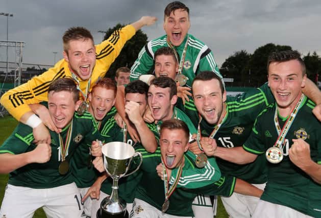 Northern Ireland's celebrate securing the Milk Cup Elite Section, after defeating Canada 1-0 in Friday night's final at this year's Milk Cup finals. Picture by Jonathan Porter/Presseye.com