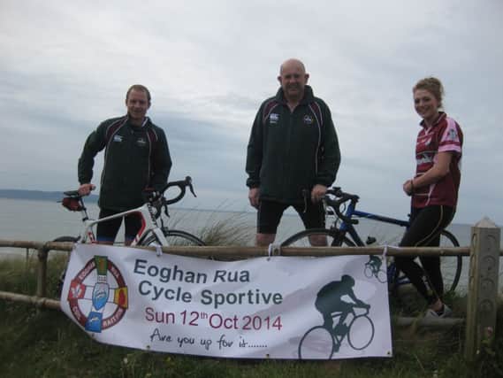 Eoghan Rua club chairman (centre) and senior players Sean Leo McGoldrick and Grainne McGoldrick getting ready for the North Coast Cycle Sportive this Sunday 12th October. (S)