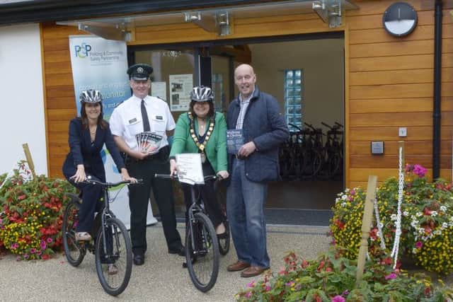Banbridge District Council Chairman Cllr Marie Hamilton, PCSP Vice Chair Hilary Dobson and Cllr Junior McCrum pictured at Banbridge District Council Cycle Hire in Scarva with Sgt Billy Stewart from Gilford Neighbourhood Policing Team who were security marking bicycles in the facility © Edward Byrne Photography INBL1440-200EB
