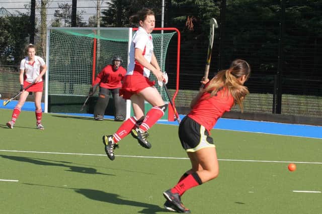 Coleraine Firsts Alice McGill taking evasive action against Newry in the Senior 4 League game. INCR41 HOCKEY