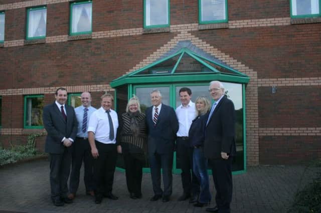 (l-r) Cllr Paul Rankin, First Minister Peter Robinson, Brenda Hale MLA and Alderman Allan Ewart with owner and representatives from Cottage Catering