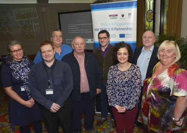 Rosalind Young, left, Programme Manager of the North West Peace III Partnership, and Catherine Cooke, right, Chair, pictured with Paul McFadden, second from right, guest speaker, and speakers who provided Peace III testimonials, from left, Colin Coyle, Derry City Council Summer Songs, Kenny McFarland, Londonderry Bands Forum, William Lamrock, Londonderry YMCA, Gerard Deane and Roisin O'Hagan, Holywell Trust, at their celebration event in the Everglades Hotel on Tuesday. INLS4014-112KM