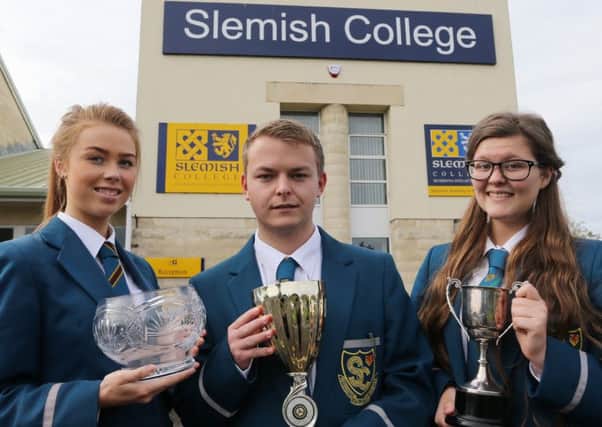 Top achievers who received awards at the Slemish College prize night, L-R, Louise Goodwin (AS Business Studies), Timothy McGarvey (GCSE Technology) and Lauren Johnston (GCSE English). INBT 40-104JC