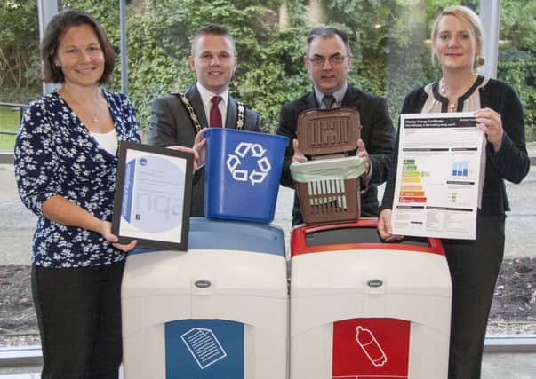 Pictured with the Environmental Management System ISO14001 certificate are (l-r): Lindsay Houston, Biodiversity Officer; Mayor of Newtownabbey Alderman Thomas Hogg; Hugh Kelly, Assistant Chief Executive and Lisa Mayne, Recycling Manager. INNT 41-517CON
