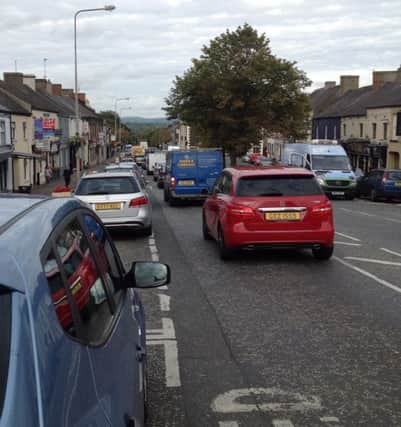 Traffic queues are a common sight in the centre of Moira village.