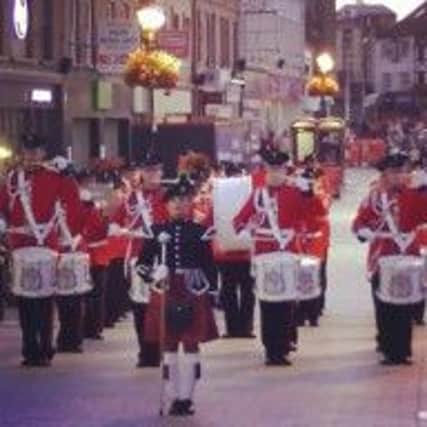 Lisburn Young Defenders in marching mode.