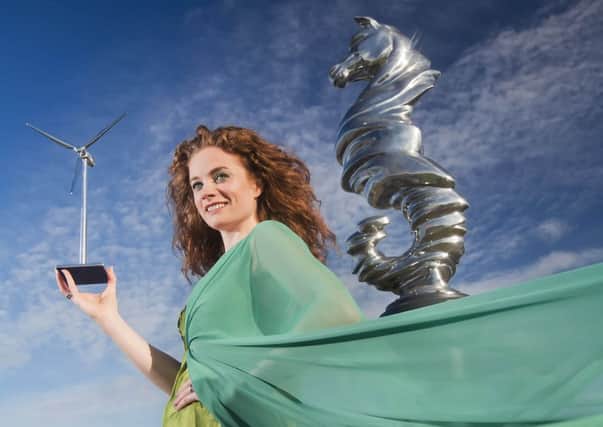 Action Renewables 'Green Goddess' Collette O'Neill launching the Action Renewables Awards in March. One local client has complained about not getting paid the export tariffs he is owed due to a difference of opinion between the company and NIE.