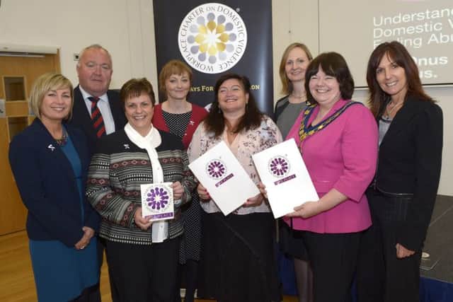 Pictured at the Launch of the Safe Place Scheme in The Old Town Hall are from left ONUS Business Manager Colette Stewart, PCSP Chair Cllr Seamus Doyle, Head of Human Resources BDC Christine Alister, Lindsay Harris (ONUS),CEO Armagh/Down Women's Aid Eileen Murphy, Banbridge District Council Chairman Cllr Marie Hamilton, E District Domestic Abuse Sergeant Jenni Rea and PCSP Vice Chair Hilary Dobson  © Edward Byrne Photography INBL1441-212EB