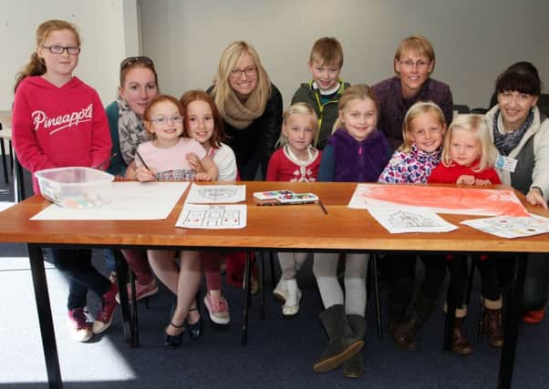 Janet Millar, artist, pictured right with children and mothers taking part in The Big Draw national event on Saturday.
