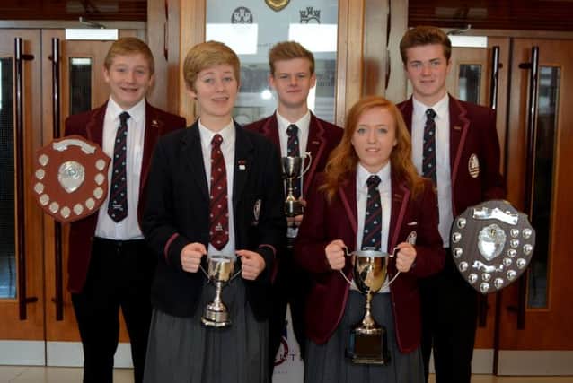 Sam Brodison, Nathan Fugard, Aaron Stevenson, Sarah Doherty and Sarah McAtamney all won awards at Carrickfergus Grammar School prize night. INCT 40-169-GR