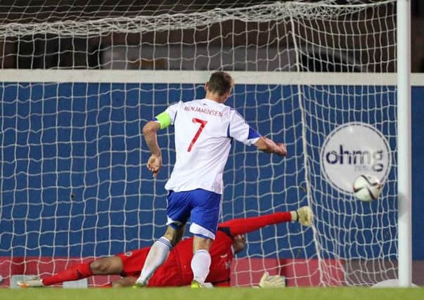 Faroe Islands Frodi Benjaminsen watches as his penalty is saved by Northern Ireland goal keeper Roy Carroll during Saturday night's EURO 2016 Group F Qualifier at Windsor Park. 
Picture by Brian Little/Presseye