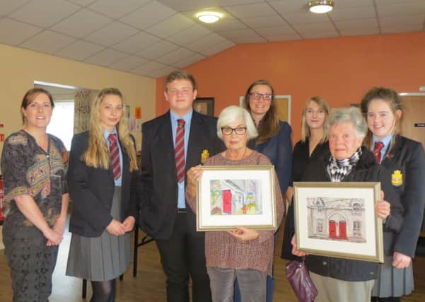 Downshire School pupils and teacher Mrs Redmond pictured with Beth Frazer and guest speaker Rosie Hickey.  Also pictured are Shiels residents Ruth Hickey and Ann Wilson.  INCT 42-730-CON