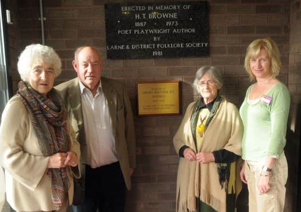 Nella Buckley, Robert Logan, Margaret Steward and Cathie Stevenson, Branch Manager of Larne Library, at the unveiling of the plaque in memory of Poet and  Playwright HT Browne, also known as John o The North. The plaque was previously displayed at Larne Town Hall. INLT 42-201-AM
