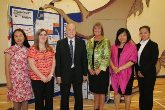 From left to right. Ms Chen Yong, Miss Fotheringham, Confucius co-ordinator Carrickfergus, Mr Creighton, chair of board of governors, Mrs Stewart, principal, Ms Yan Li, director Confucius Classrooms and Ms Liu Oumei. INCT 42-790-CON
