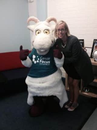Wallace Prep Principal, Mrs Corine latham, pictured with Cancer Focus mascot Genevieve the Goat.