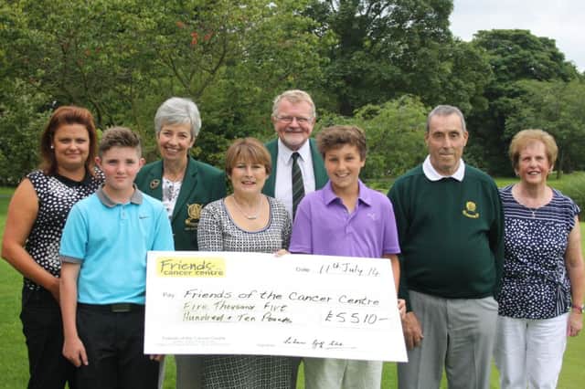 Lisburn GC Captain Mr Peter Cairns and Lady Captain Mrs Gil Colvin present Colleen Shaw from Friends of Cancer with a cheque. Also in the photograph are helpers on the Golf Day Harry McNellis and Matthew Kelso along with Maurice and Shelia Leathem and Jane McCambley.