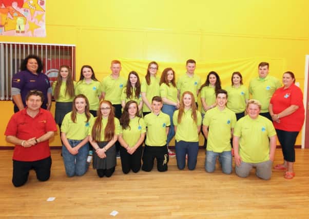 SELB Craigavon Rural youth forum members after receiving their new club T-shirts pictured with support youth workers (back row) Bethany Ebron & Liz Hoy and (front row) Larry Hamilton. INLM39-1123