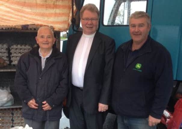 During a visit to Carrickfergus on Thursday, the Presbyterian Moderator Rev Dr Michael Barry called into to the market at Joymount where he met Norman Laird and Billy Hill. INCT 42-750-CON
