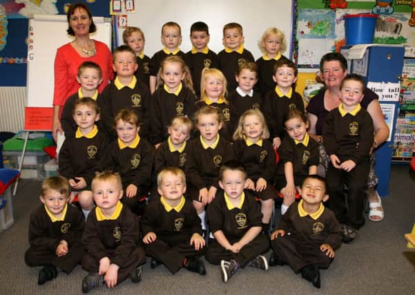 Buick Memorial PS P1 pupils with their teacher Mrs. J. McCluggage and classroom assistant Mrs. M. McBurney. INBT40-735AC