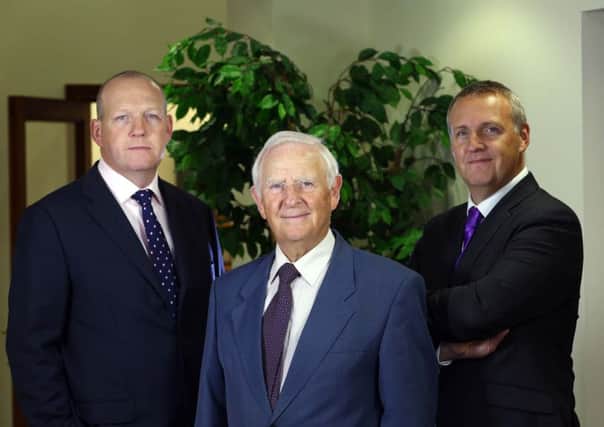 Tom Eakin (middle), founder of the Eakin Group is pictured with Jeremy Eakin, Director and Paul Eakin, Managing Director at the companys head office in Comber. INLT 43-677-CON