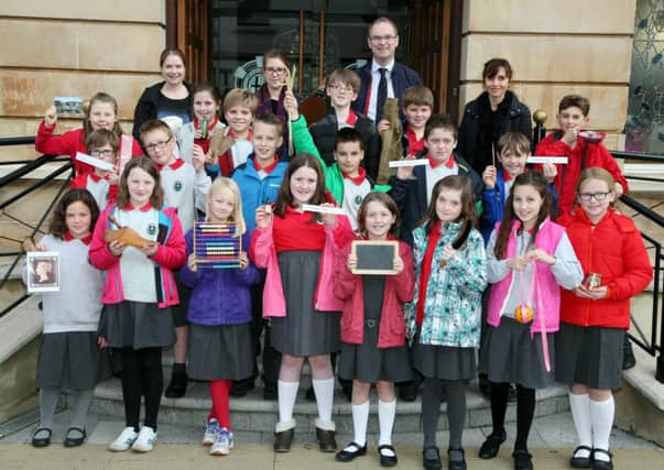 DH Christie Memorial Primary School Year 7 pupils pictured at Coleraine Town Hall on last Monday morning for the Victorian Tour. Included are; Ashley Kirkpatrick and Sarah Carson, both Causeway Museum Service, Chris Murdock, teacher, and Angelique Watson, classroom assistant. INCR43-300PL