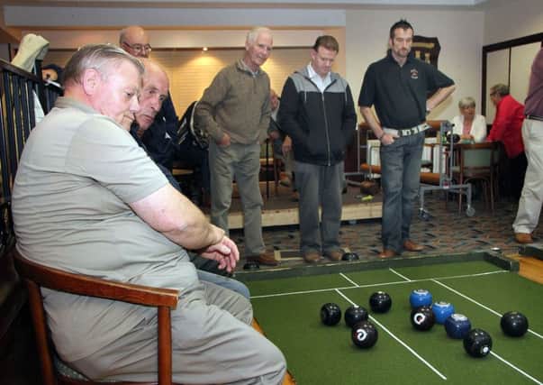All eyes were on the mat at the Services Club as the Services 'A' team took on Golf Seniors. INBT 32-809H