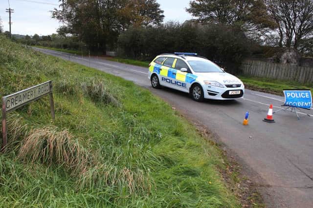 Police cordon off the Creamery Road in Coleraine on Wednesday after a two car crash left a young women dead.PICTURE MARK JAMIES0N.