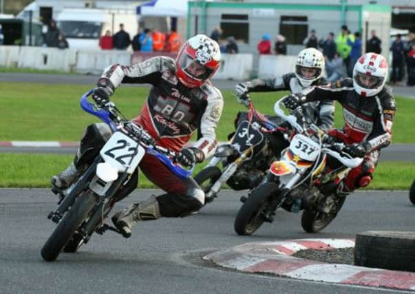Barry Davidson from Glarryford, ahead of Kyle Cross, 31, and Sam Dunlop, 327, in the Invitation race. Picture: Roy Adams.