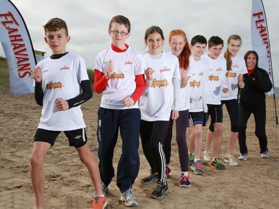 Pictured L-R are Orán McCafferty (11) from Lurgan who attends St Colmans Newry, James Walker (11) from Tandragee Junior High, Abby Tate (11) from Moira who attends Friends, Lisburn, Anna Conlon (10) from Tannahgmore PS, Lurgan, Odhran Hamilton (11) from St Patricks PS, Armagh, Jack Scott (12) from Tandragee Junior High School and Suzy Neill (12) from Banbridge Academy and Commonwealth Games star Gladys Ganiel.