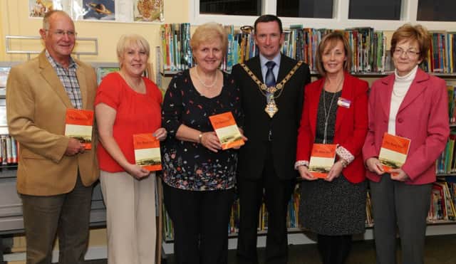 Pictured at Coleraine Library for the launch of the Bann Disc (Vol.20) last Wednesday evening are from left; Tommy McDonald (Impact Printing), Jean Clayton (Secretary), Jennifer Cunningham (Editor and Committee), Councillor George Duddy (Mayor of Coleraine), Jean Fitzpatrick (Libraries NI), and Diana Kirkpatrick (Treasurer). INCR43-302PL