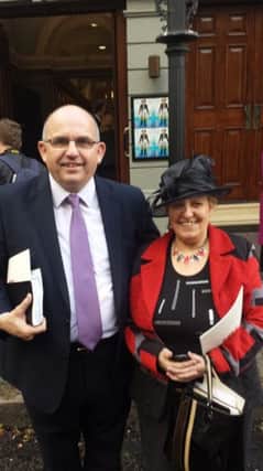 Cllr John Finlay and wife Linda leaving memorial service for Dr Paisley. inbm43-14s