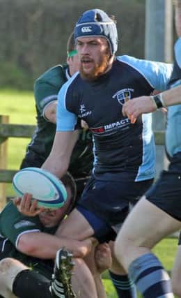 LEG GO. Ballymoney 3rds player, Neal Mulholland looks to set-up an attack during his side's games against City of Derry on Saturday.INBM43-14 035SC.