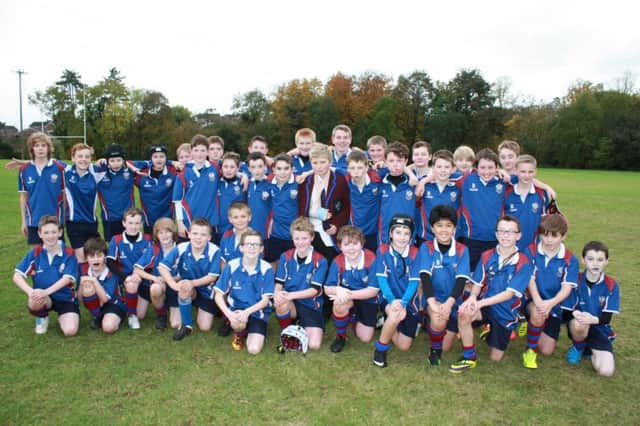 Dalriada's Year 8 rugby squad celebrating their wins over Cambridge House  9-0,11-0 and 15-0 . INBM43-14S