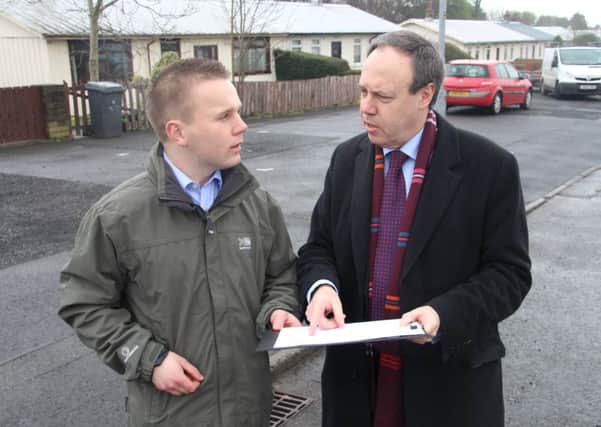 Nigel Dodds MP with Alderman Thomas Hogg visiting the Abbeyville area.
