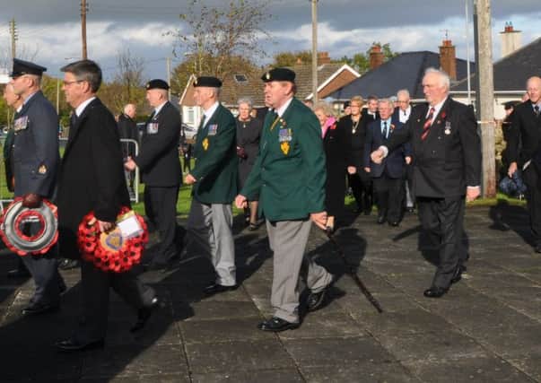 A parade took place from the community centre to the new Ballycarry War Memorial on Sunday INLT 43-664-CON