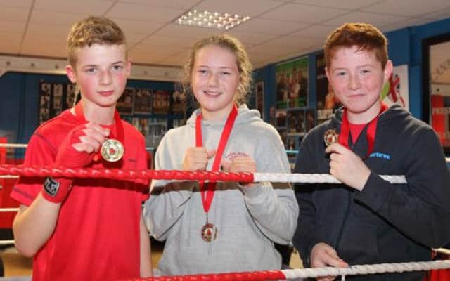 Thomas Maxwell, Mia Neill and Reece Russell from Canal Boxing Club all won medals at the recent Ulster Novice Championships, held in Banbridge. US1443-501cd  Picture: Cliff Donaldson