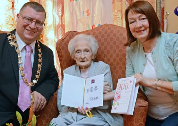Congratulations all round for Martha Hanna born Martha McIlroy of Ballyfore near Larne. Marty as she is affectionately known celebrated her 100th Birthday in Larne Care Centre with family parties and a special card from the Queen also a suprise visit and gift from Mayor Councillor Martin Wilson on behalf of Larne Borough Council. Helping her to celebrate was her daughter Hazel Reymond.