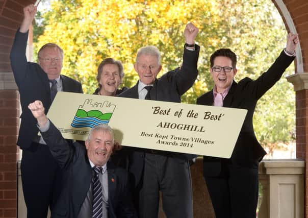 PACEMAKER, BELFAST, 21/10/2014: Ahoghill in Co Antrim has been named the overall winner in the 2014 Best Kept Towns, Villages and Housing Areas awards, organised by the NI Amenity Council. Celebrating their success are John Small, Alderman Maurice Mills, Denise Reynolds and Derek McKay with Doreen Muskett, MBE,  Chair of NI Amenity Council (2nd left).
PICTURE BY STEPHEN DAVISON