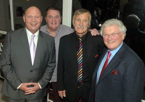 Larne FC's famous 'Meeter and Greeter', Jim Dobbin, with David Jefferey, Paul Malone and Jackie Fullerton.