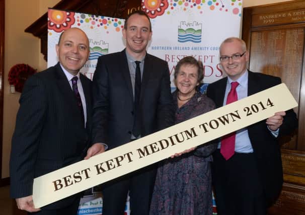 Cookstown in Co. Tyrone was crowned the Best Kept Medium Town at the 2014 Best Kept Towns, Villages and Housing Areas awards.

Pictured (l-r): Dave Foster, Department of the Environment, Cathal Mallaghan, Vice-Chairman, Cookstown District Council, Doreen Muskett MBE, Chair of the Northern Ireland Amenity Council and Terry Scullion, Head of Technical Services, Cookstown District Council.