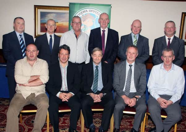 Coaches and officals of the Ballymena Mini Soccer league join Arthur McClean, Steven Penny and Michael O'Neill at last week's special function in the Adair Arms Hotel. INBT 44-815H