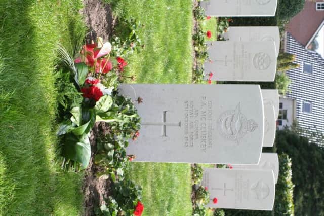 Airman McCluskey's grave in Rhenen. INBM44-14 S